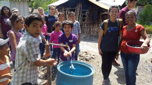 Los Hatillos Children At Faucet.JPG